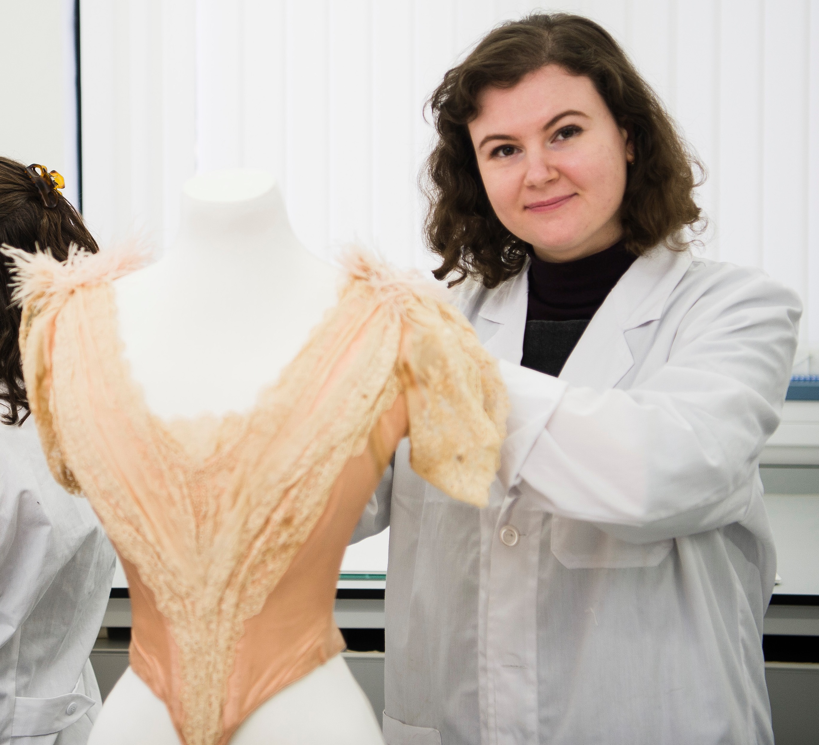 Charlotte Baker with a mounted dress